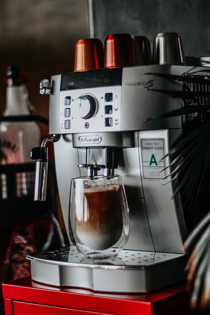 A sleek espresso machine making cappuccino indoors for coffee lovers.